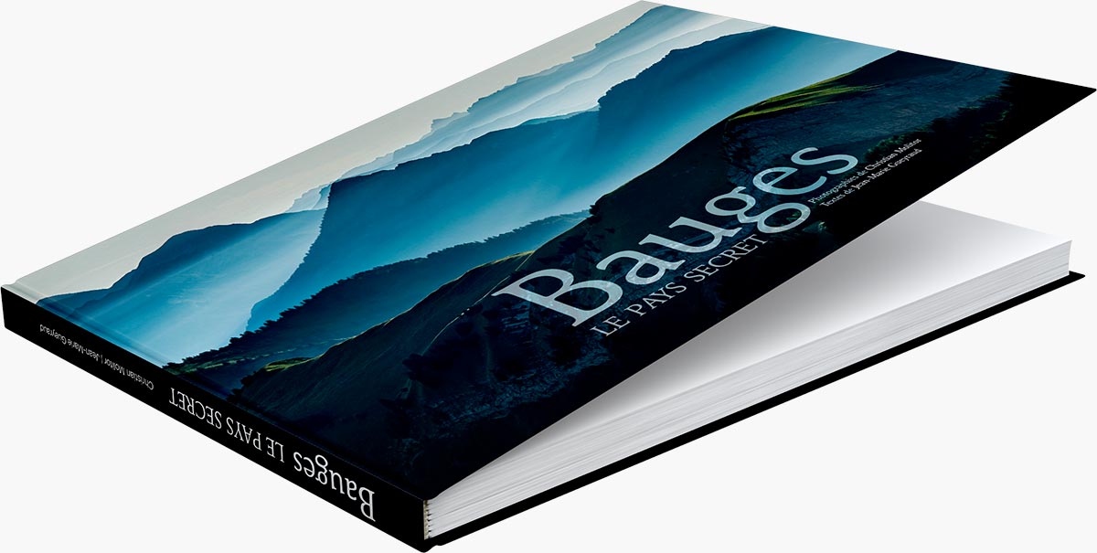 Mise en page du livre "Bauges, le pays secret" du photographe Christian Molitor