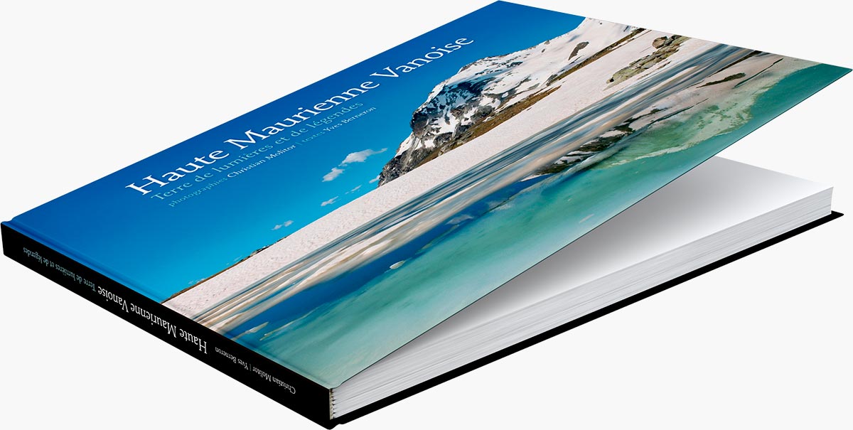 Mise en page du livre "Haute Maurienne Vanoise, terre de lumières et de légendes" du photographe Christian Molitor